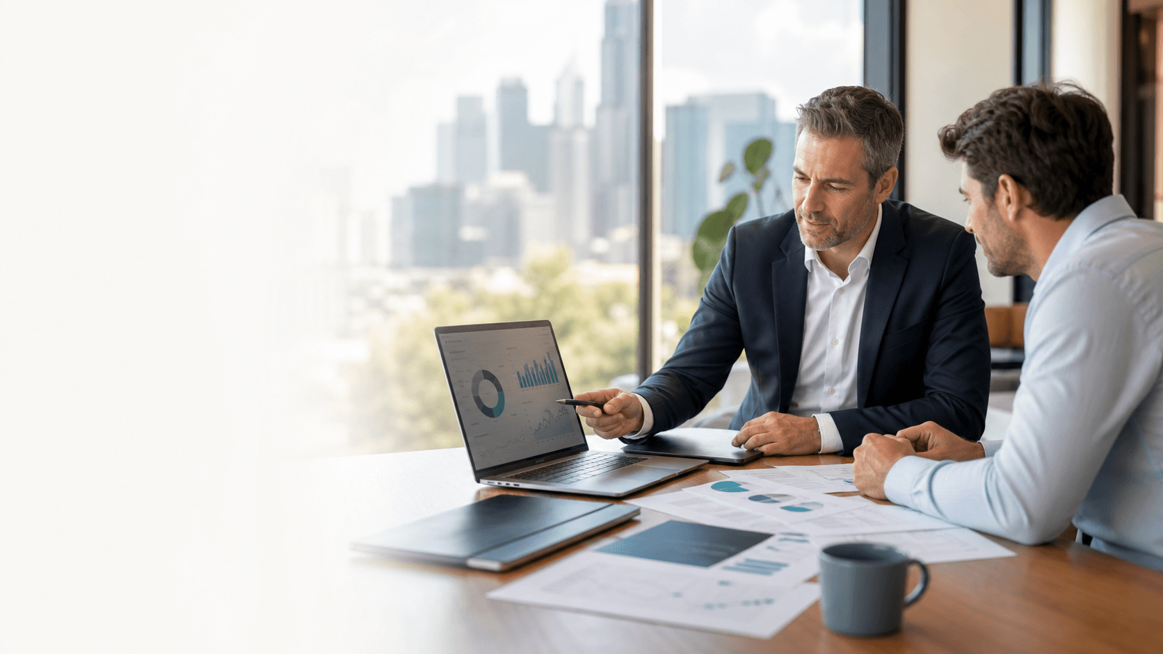 Financial advisers reviewing business insights
